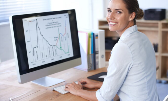 Analyzing the latest figures Finding business solutions online. Cropped shot of an office environment