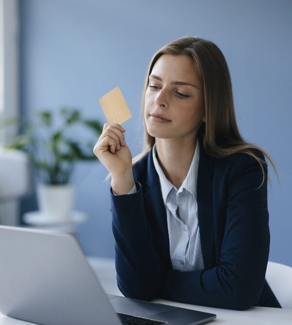 Young businesswoman doing online payment with her credit card